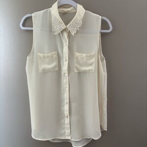 Pearl sleeveless button down